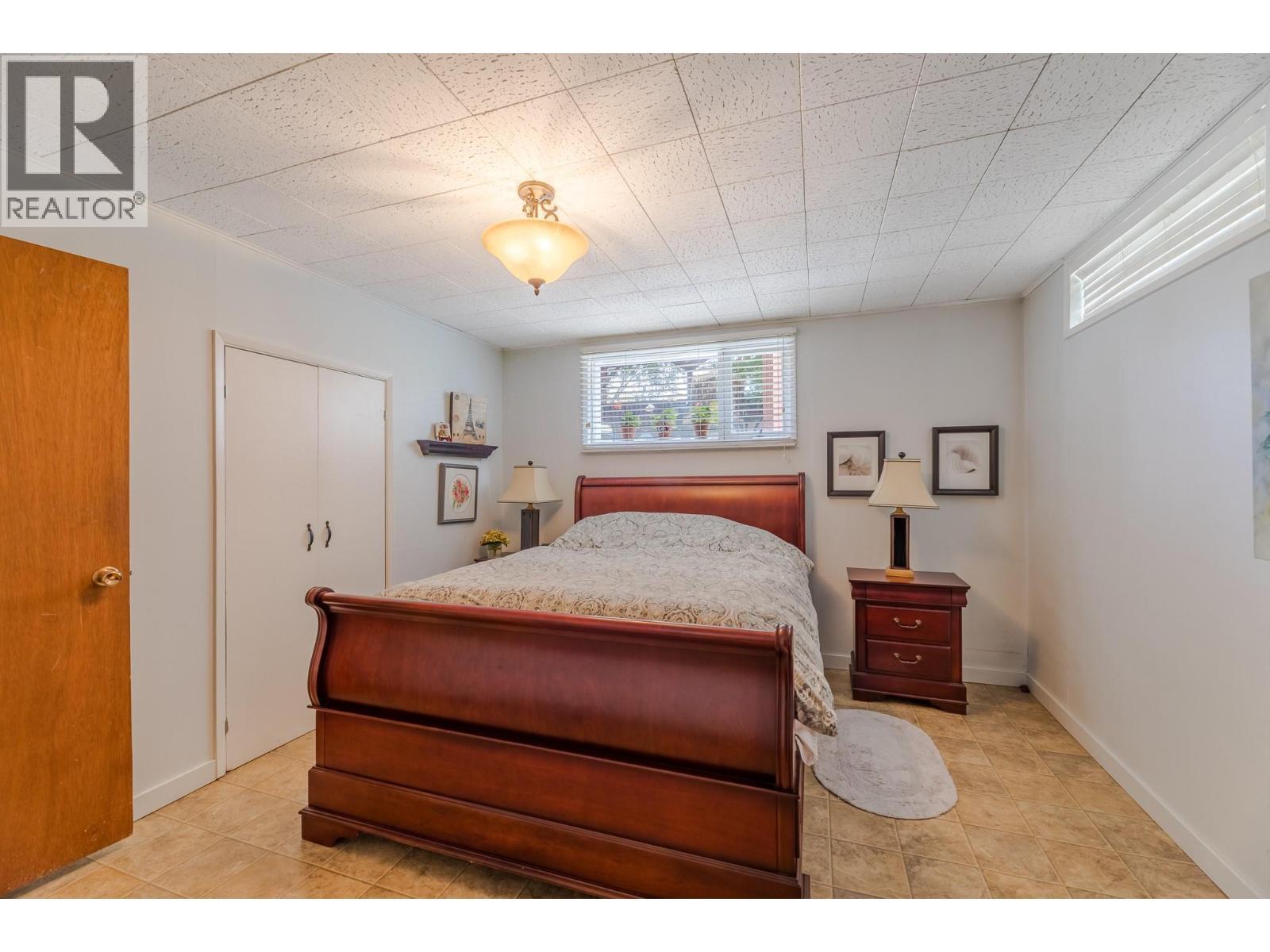 14001 Amm Avenue, Summerland, BC - Indoor Photo Showing Bedroom
