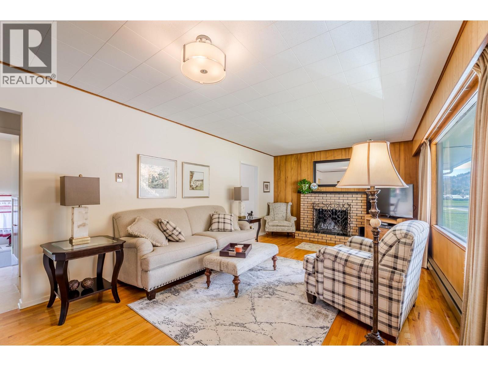 14001 Amm Avenue, Summerland, BC - Indoor Photo Showing Living Room With Fireplace