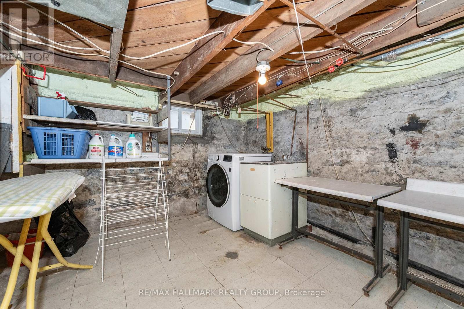 Laundry Area in Section of the Original Basement - 55 Smirle Avenue, Ottawa, ON - Indoor Photo Showing Laundry Room