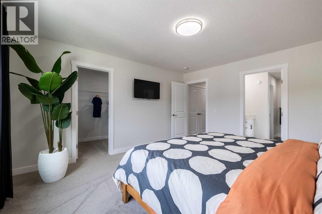 432 Ranch Gate, Strathmore, AB - Indoor Photo Showing Bedroom