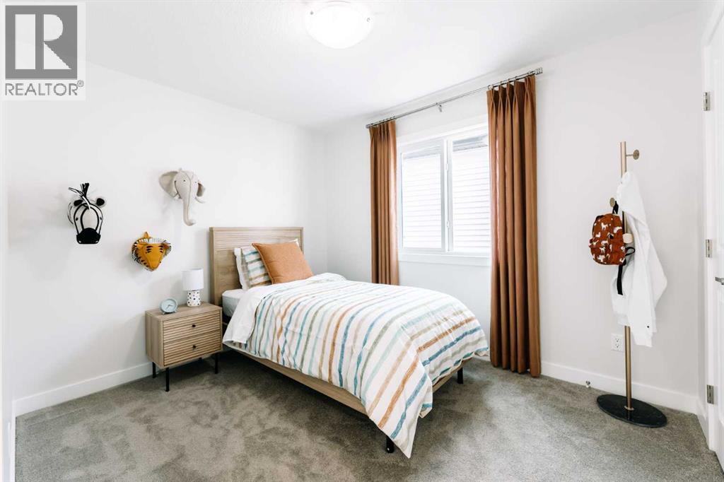 432 Ranch Gate, Strathmore, AB - Indoor Photo Showing Bedroom