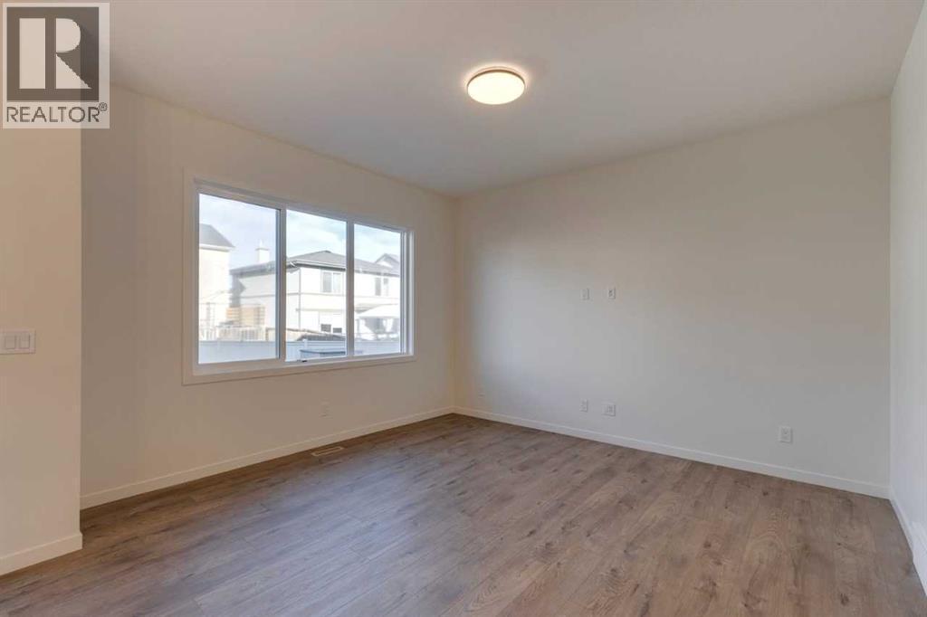 1379 Bayview Crescent Sw, Airdrie, AB - Indoor Photo Showing Other Room