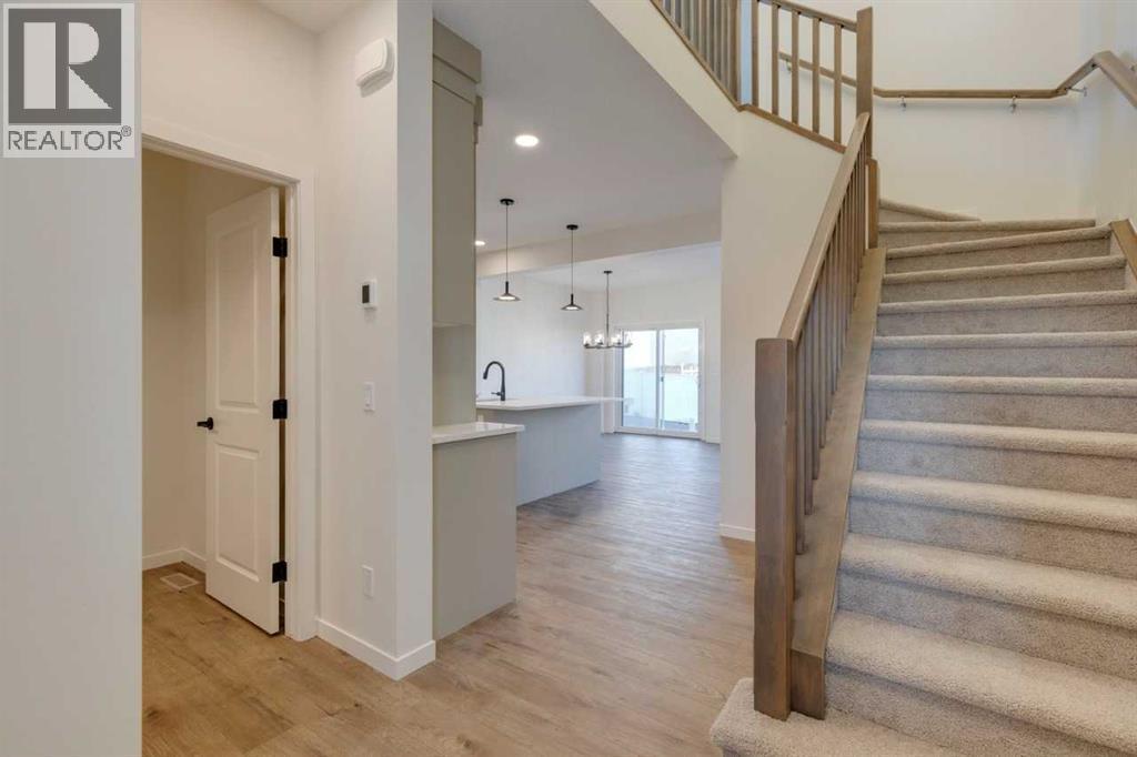 1379 Bayview Crescent Sw, Airdrie, AB - Indoor Photo Showing Other Room