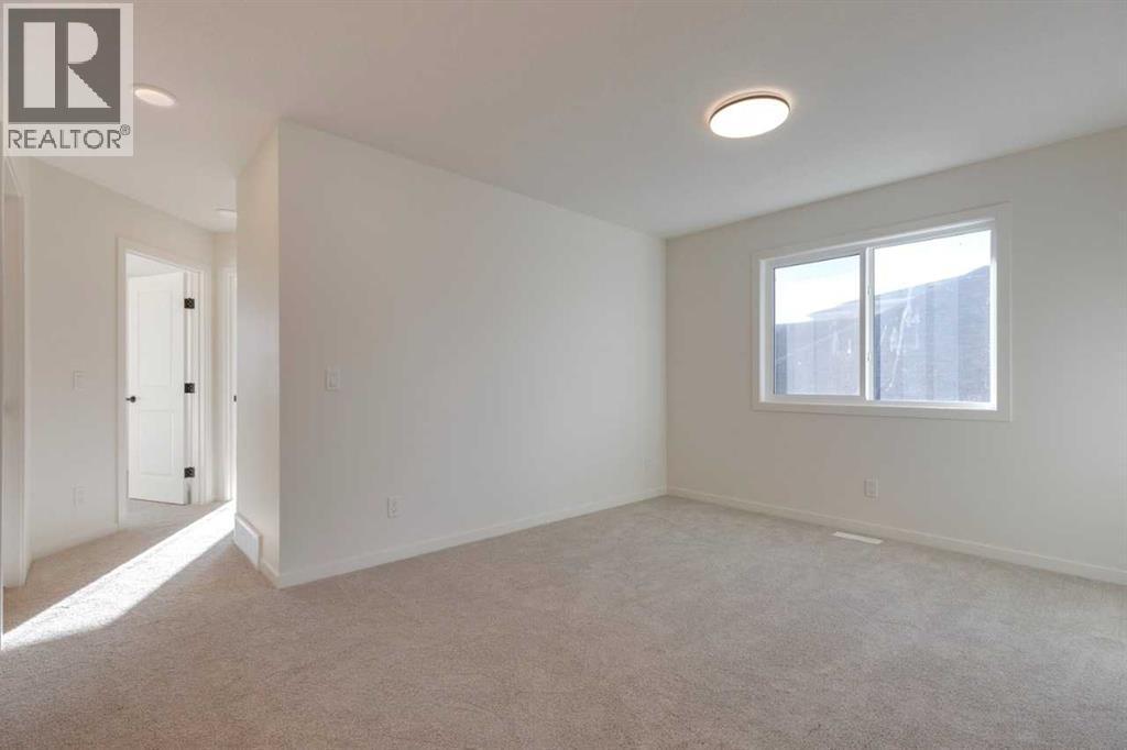 1379 Bayview Crescent Sw, Airdrie, AB - Indoor Photo Showing Other Room