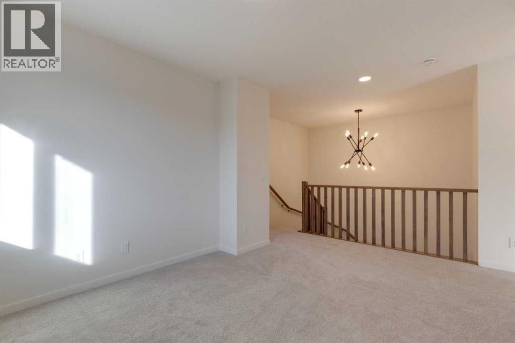 1379 Bayview Crescent Sw, Airdrie, AB - Indoor Photo Showing Other Room