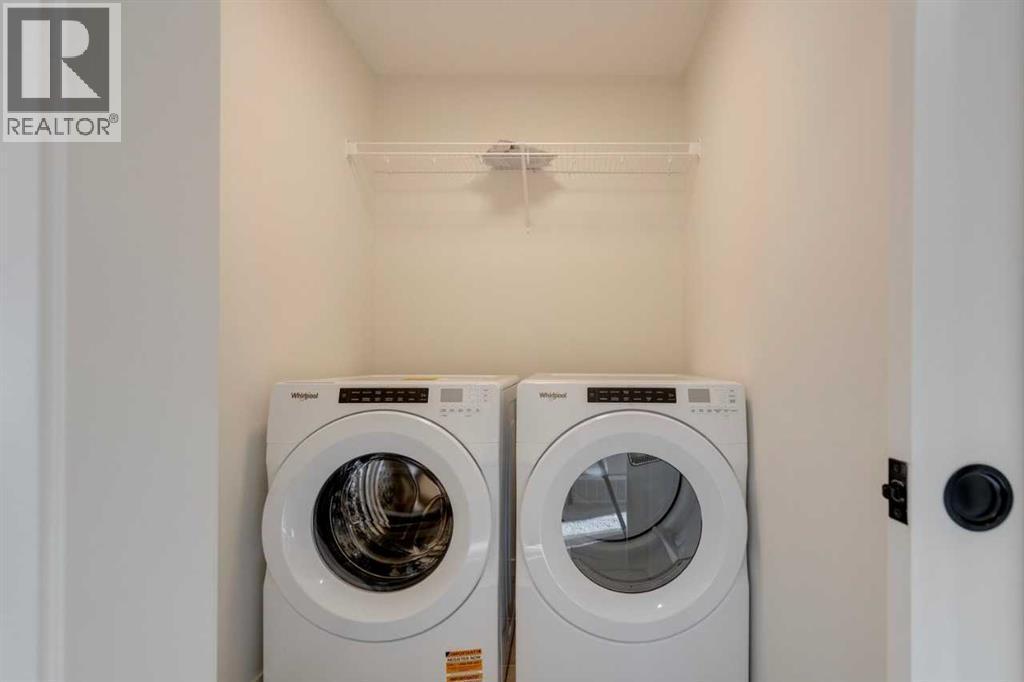 1379 Bayview Crescent Sw, Airdrie, AB - Indoor Photo Showing Laundry Room