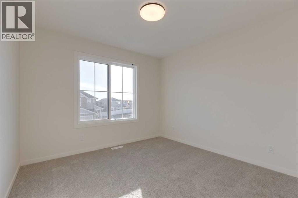 1379 Bayview Crescent Sw, Airdrie, AB - Indoor Photo Showing Other Room