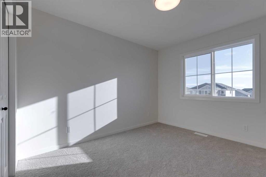 1379 Bayview Crescent Sw, Airdrie, AB - Indoor Photo Showing Other Room