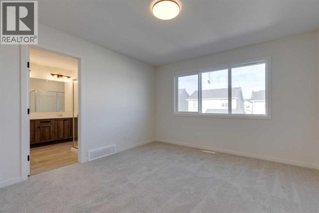 1379 Bayview Crescent Sw, Airdrie, AB - Indoor Photo Showing Other Room