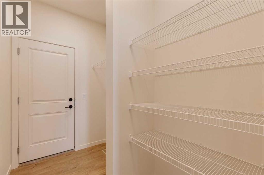 1379 Bayview Crescent Sw, Airdrie, AB - Indoor With Storage