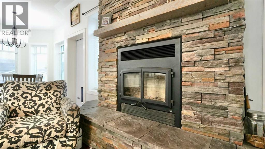 8245 102 Avenue, Peace River, AB - Indoor With Fireplace