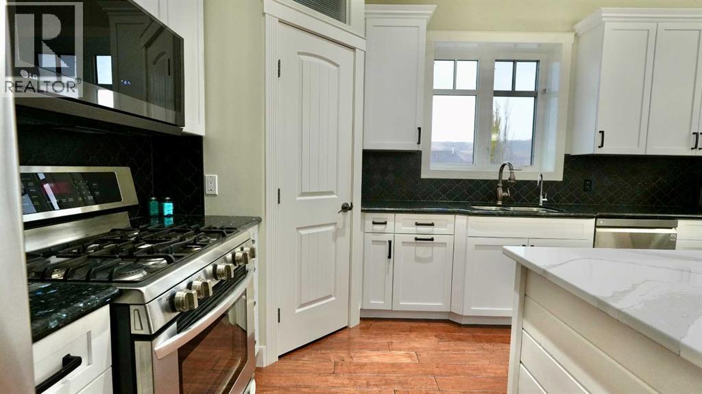 8245 102 Avenue, Peace River, AB - Indoor Photo Showing Kitchen