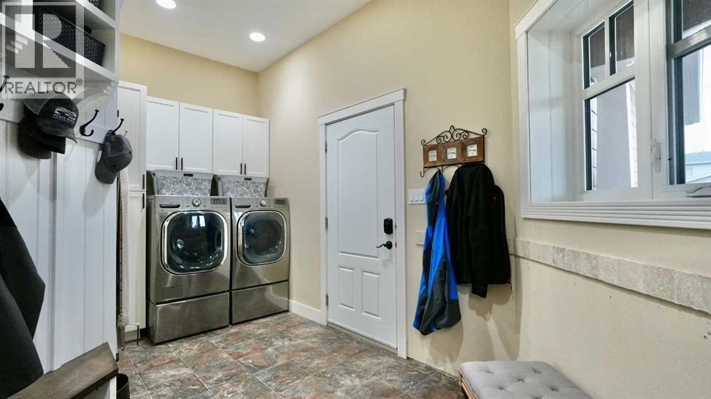 8245 102 Avenue, Peace River, AB - Indoor Photo Showing Laundry Room