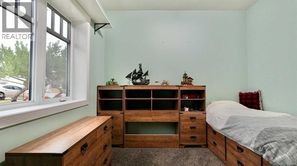 8245 102 Avenue, Peace River, AB - Indoor Photo Showing Bedroom