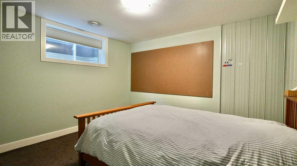 8245 102 Avenue, Peace River, AB - Indoor Photo Showing Bedroom