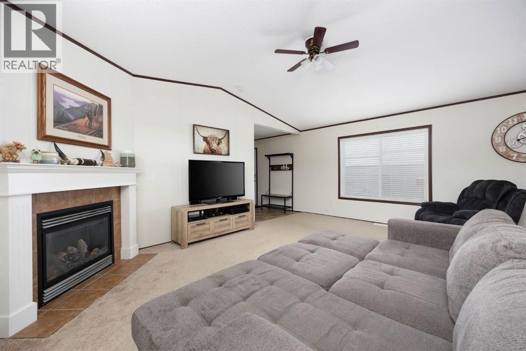 328 Grey Crescent, Fort Mcmurray, AB - Indoor Photo Showing Living Room With Fireplace