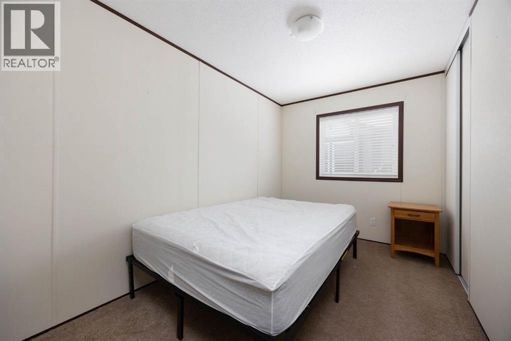 328 Grey Crescent, Fort Mcmurray, AB - Indoor Photo Showing Bedroom