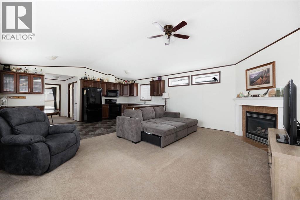 328 Grey Crescent, Fort Mcmurray, AB - Indoor Photo Showing Living Room With Fireplace