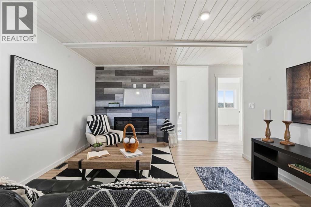 6 Metcalf Way, Lacombe, AB - Indoor With Fireplace