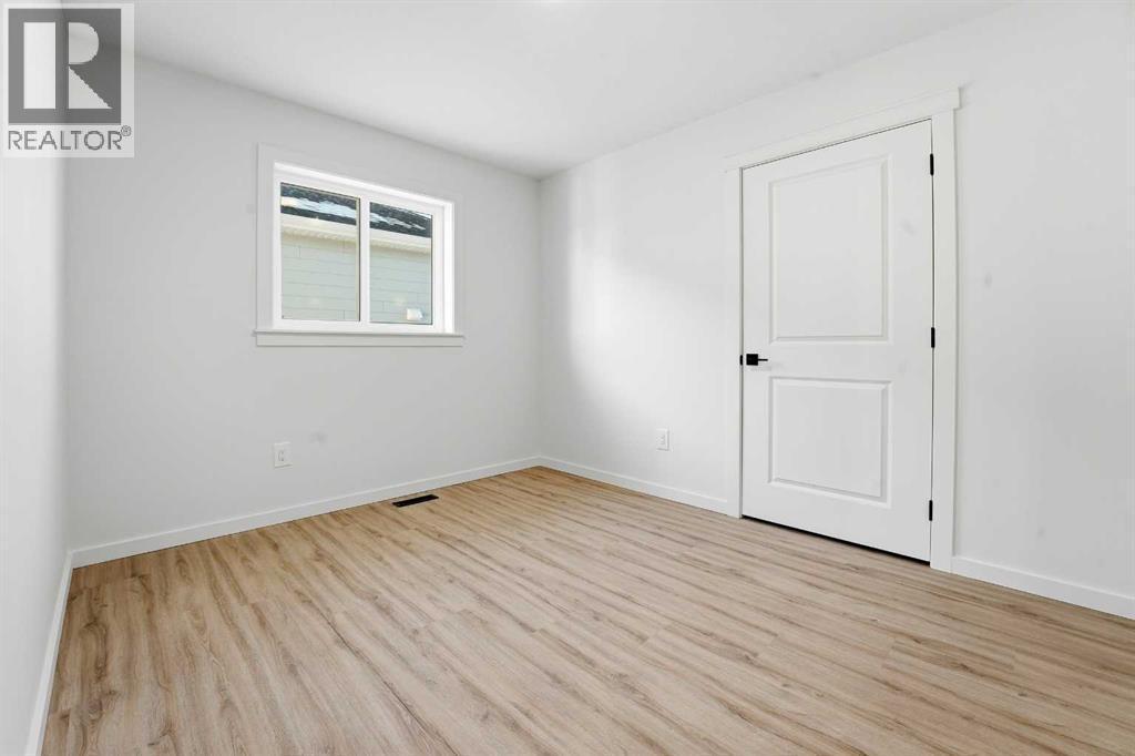6 Metcalf Way, Lacombe, AB - Indoor Photo Showing Other Room