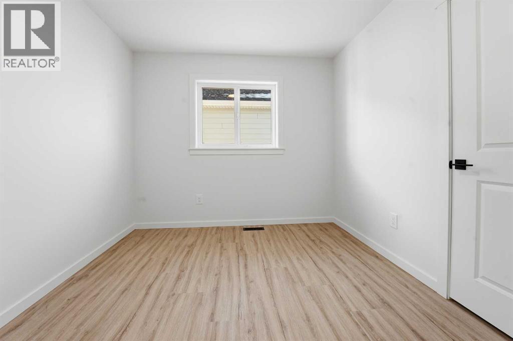 6 Metcalf Way, Lacombe, AB - Indoor Photo Showing Other Room