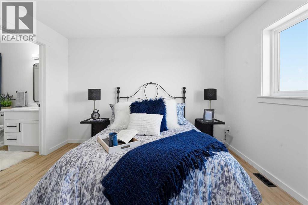 6 Metcalf Way, Lacombe, AB - Indoor Photo Showing Bedroom