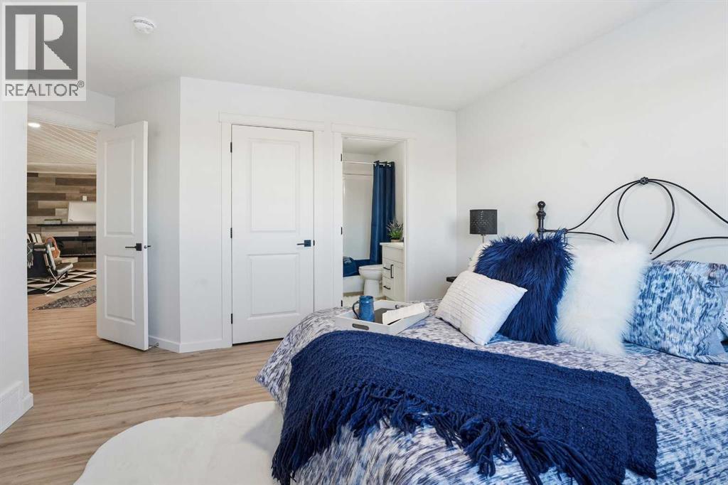 6 Metcalf Way, Lacombe, AB - Indoor Photo Showing Bedroom