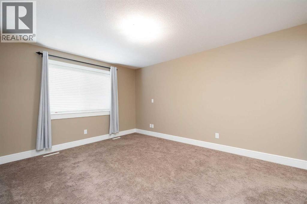 Primary Bedroom - 197 Snowy Owl Way Nw, Fort Mcmurray, AB - Indoor Photo Showing Other Room