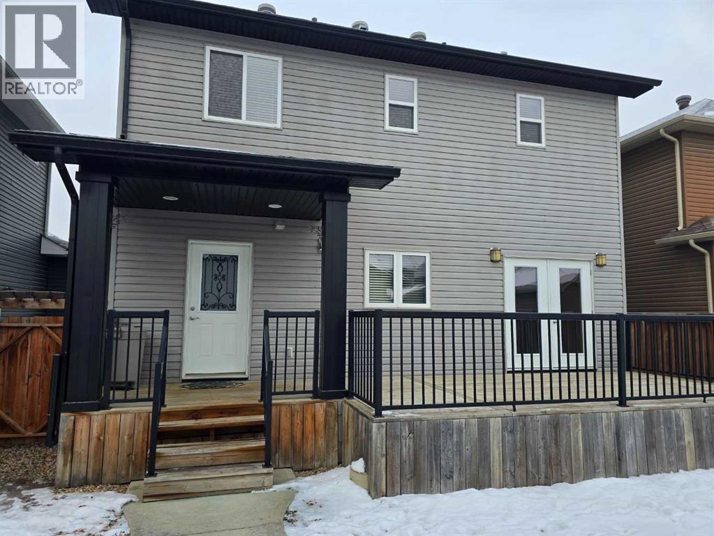 View of back of home - 197 Snowy Owl Way Nw, Fort Mcmurray, AB - Outdoor With Deck Patio Veranda With Exterior