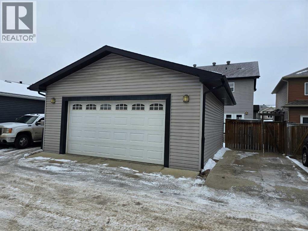 Dble heated garage with additional parking - 197 Snowy Owl Way Nw, Fort Mcmurray, AB - Outdoor With Exterior