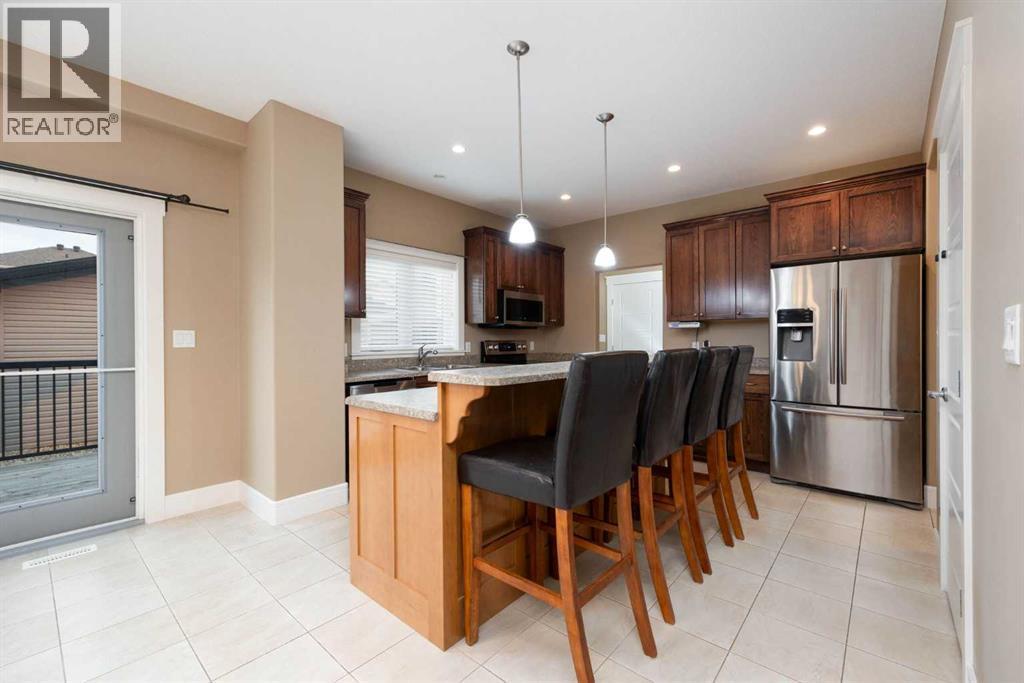 Kitchen view from dining room - 197 Snowy Owl Way Nw, Fort Mcmurray, AB - Indoor