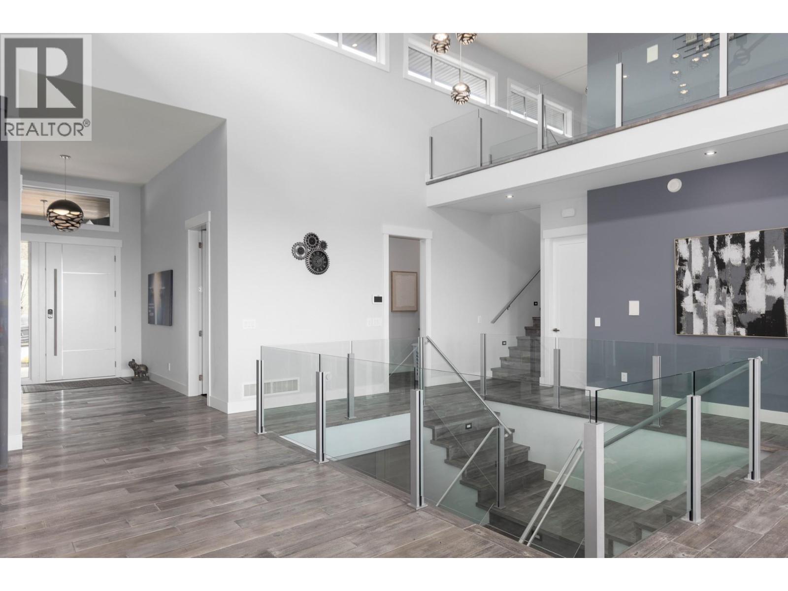 hide-a-hose vacuum - 1088 Clarance Avenue, Kelowna, BC - Indoor Photo Showing Other Room