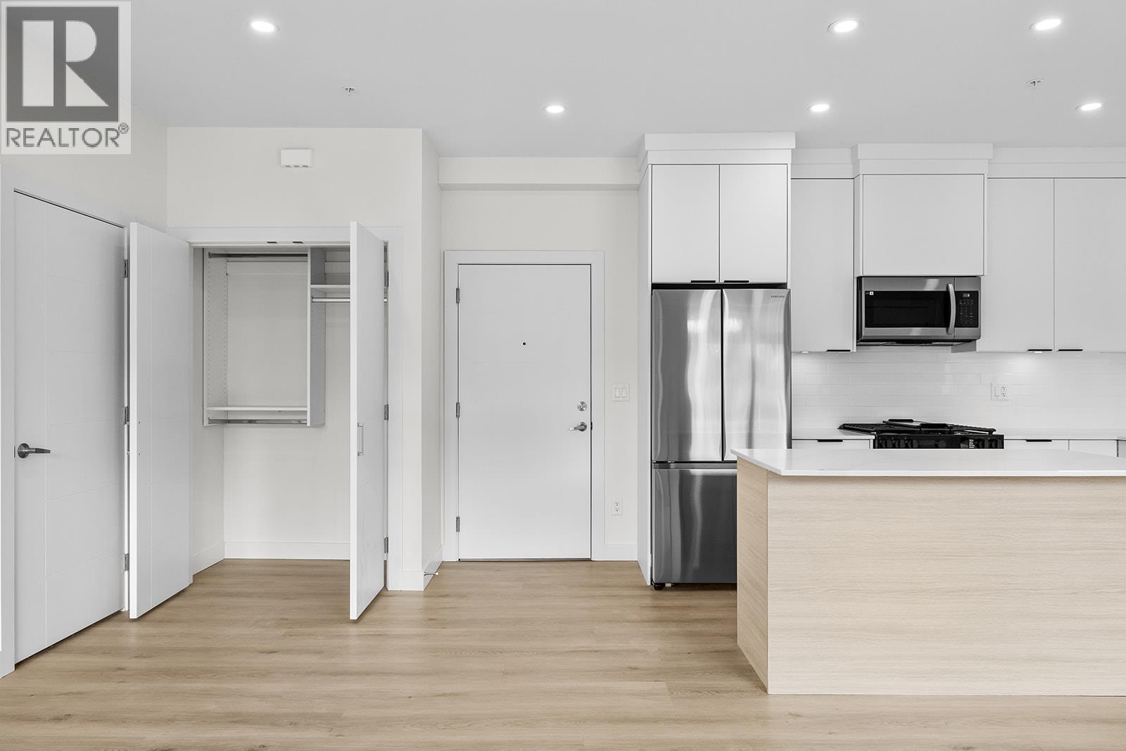 Photos may be of a similar home in the community - 5300 Main Street Unit# 202, Kelowna, BC - Indoor Photo Showing Kitchen With Upgraded Kitchen