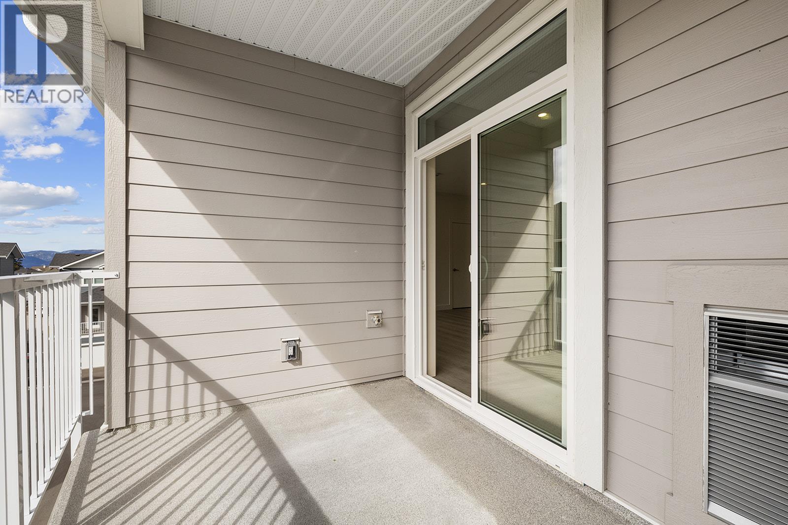 Photos may be of a similar home in the community - 5300 Main Street Unit# 202, Kelowna, BC - Outdoor With Balcony With Exterior