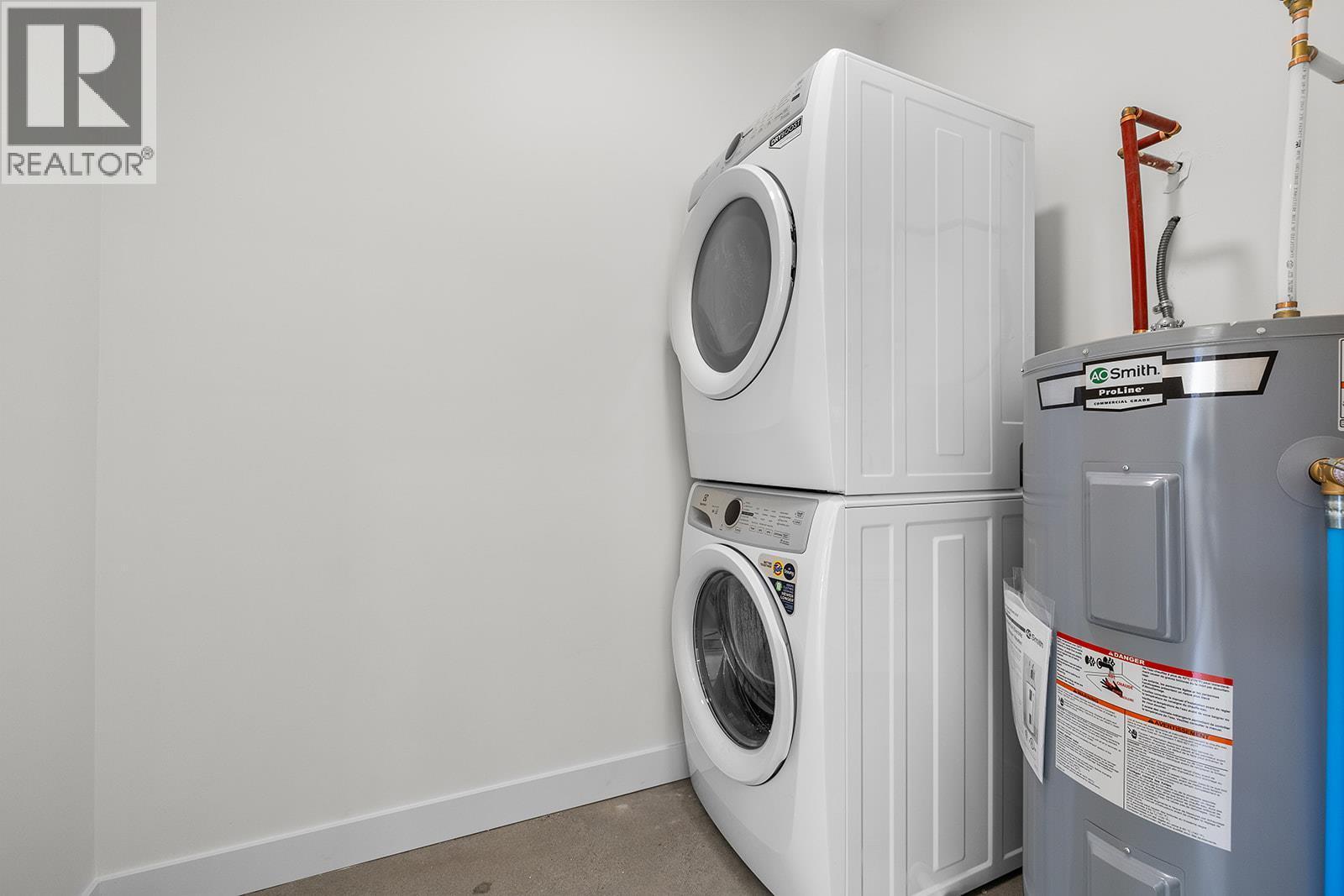Photos may be of a similar home in the community - 5300 Main Street Unit# 202, Kelowna, BC - Indoor Photo Showing Laundry Room