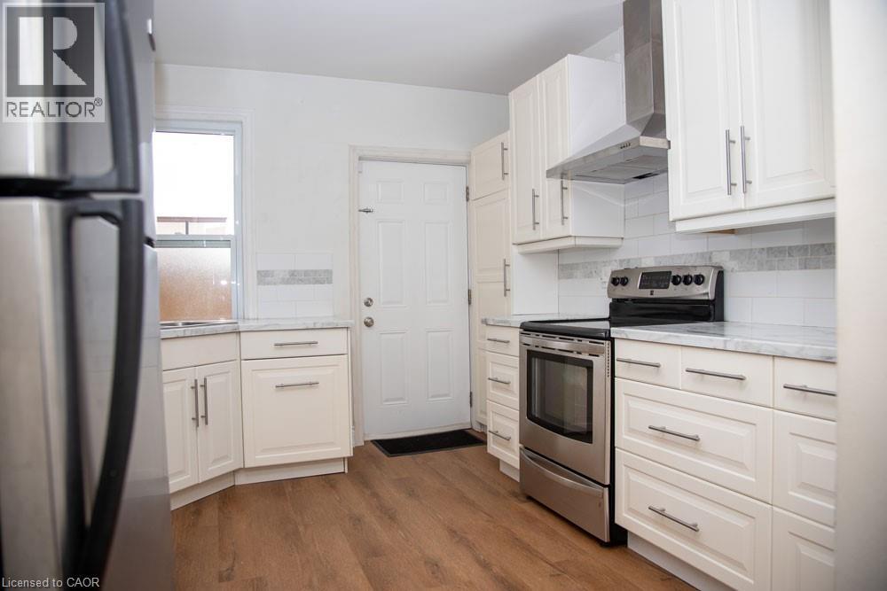 116 Bay Street N, Hamilton, ON - Indoor Photo Showing Kitchen With Stainless Steel Kitchen