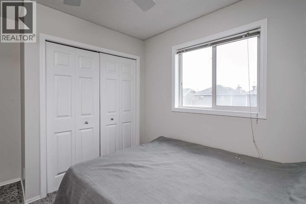 222 Bridleridge Way Sw, Calgary, AB - Indoor Photo Showing Bedroom