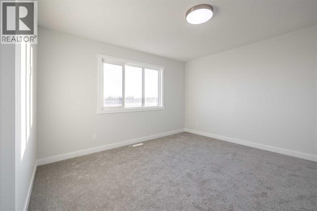 17 Sora Gardens Se, Calgary, AB - Indoor Photo Showing Other Room
