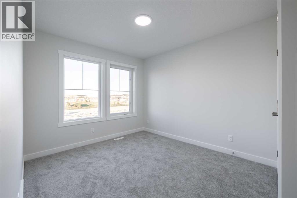 17 Sora Gardens Se, Calgary, AB - Indoor Photo Showing Other Room