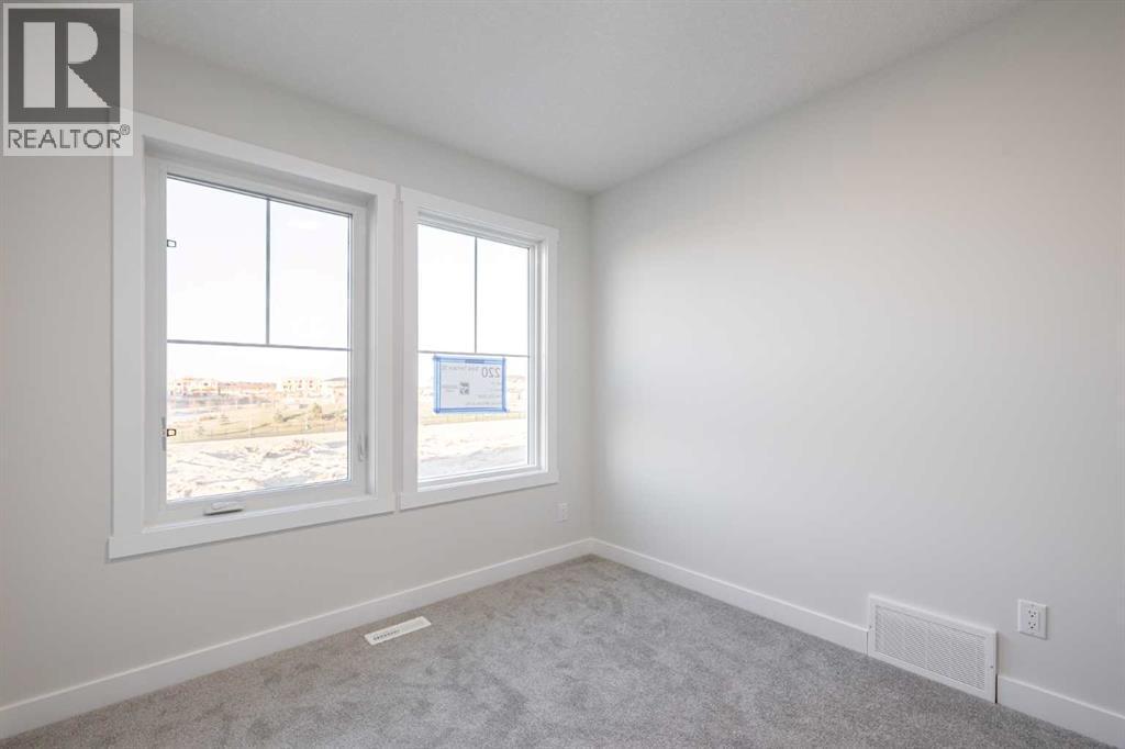 17 Sora Gardens Se, Calgary, AB - Indoor Photo Showing Other Room