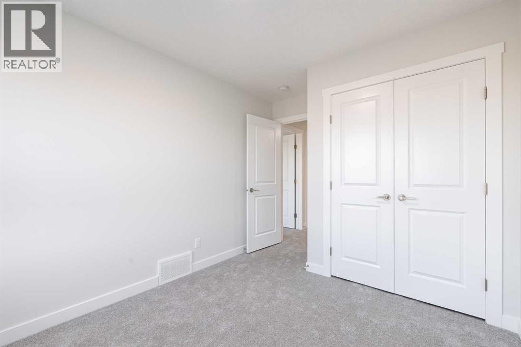 17 Sora Gardens Se, Calgary, AB - Indoor Photo Showing Other Room