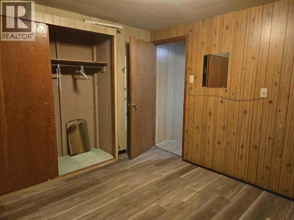 Downstairs Bedroom - 101 Simpson Street, Hinton, AB - Indoor Photo Showing Other Room