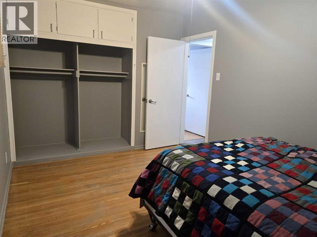 Primary Bedroom - 101 Simpson Street, Hinton, AB - Indoor Photo Showing Bedroom