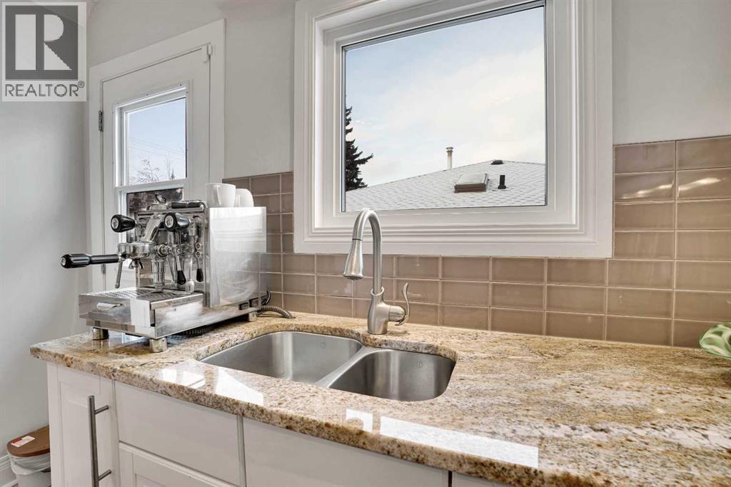 1317 9 Street Nw, Calgary, AB - Indoor Photo Showing Kitchen With Double Sink