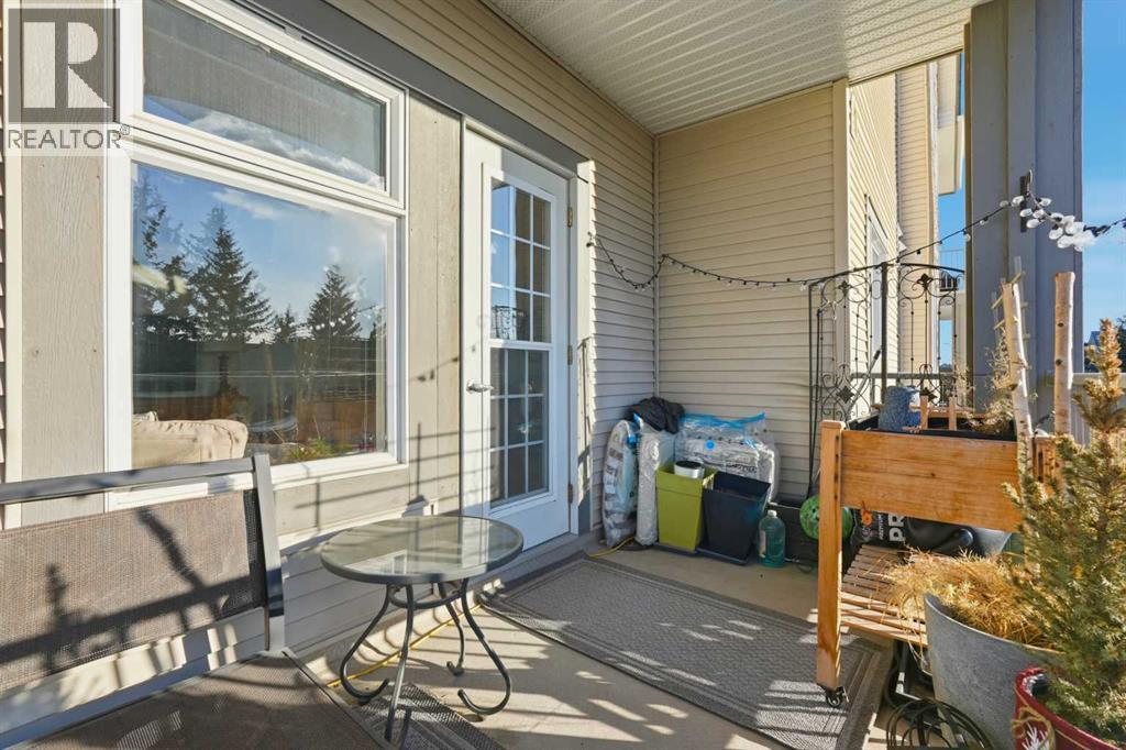 203, 11170 30 Street Sw, Calgary, AB - Outdoor With Deck Patio Veranda With Exterior