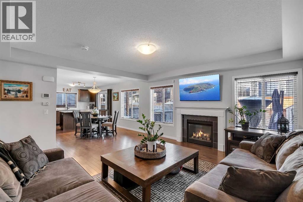 136 Viewpointe Terrace, Chestermere, AB - Indoor Photo Showing Living Room With Fireplace