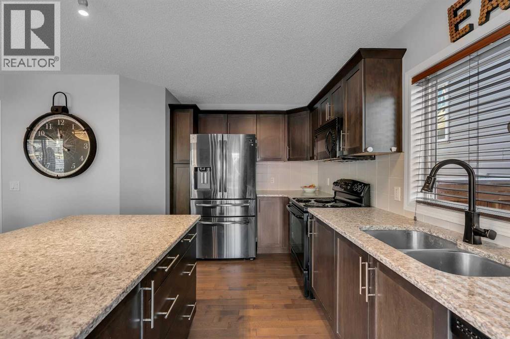 136 Viewpointe Terrace, Chestermere, AB - Indoor Photo Showing Kitchen With Double Sink