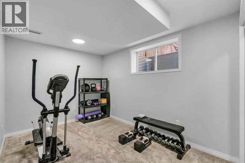 136 Viewpointe Terrace, Chestermere, AB - Indoor Photo Showing Gym Room