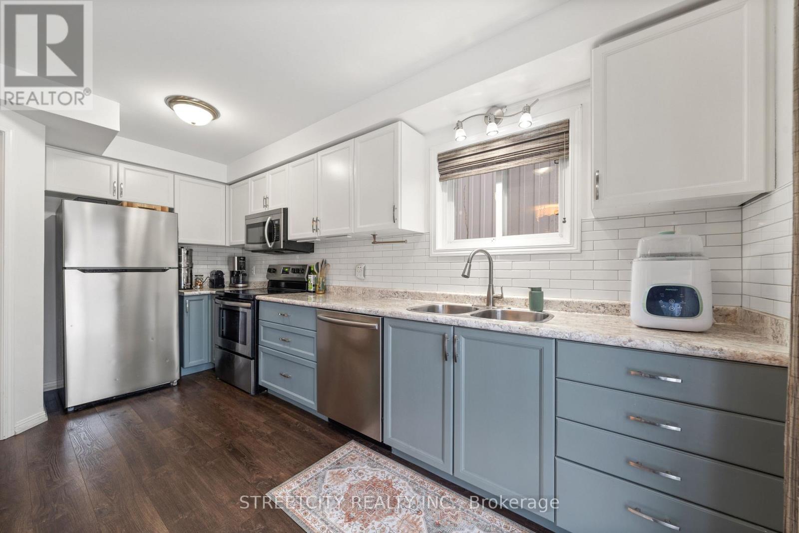8 Shipley -kitchen with stainless steel appliances - 8 Shipley Avenue, Clarington, ON - Indoor Photo Showing Kitchen With Double Sink