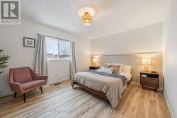 8 Shipley - bright primary bedroom -